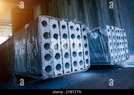 A large stack of concrete slabs on a construction site Stock Photo