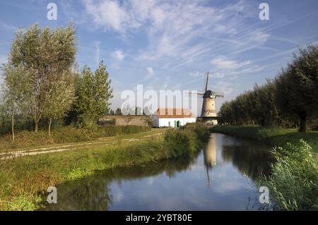 The Kilsdonkse windmillThe Kilsdonkse mill on the river Brabantse Aa near the Dutch village Dinther is a unique combination of windmill and watermill Stock Photo