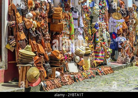 Traditional trade of typical products, souvenirs and gifts of various types in the streets and sidewalks of Pelourinho in the city of Salvador, Bahia Stock Photo