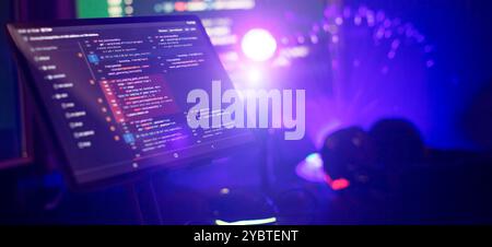 Working atmosphere of a programmer at home, background. Programming code abstract Stock Photo