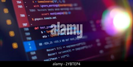 Working atmosphere of a programmer at home, background. Programming code abstract Stock Photo