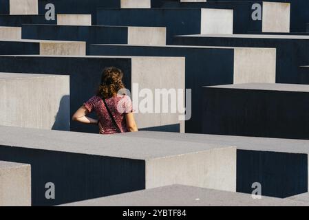 Berlin, Germany, July 28, 2019: The Memorial to the Murdered Jews of Europe, also known as the Holocaust Memorial, designed by architect Peter Eisenma Stock Photo