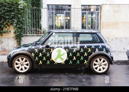 Berlin, Germany, July 29, 2019: Mini vehicle with Ampelmannchen symbol. Literally little traffic light man, diminutive of Ampelmann, is the symbol sho Stock Photo