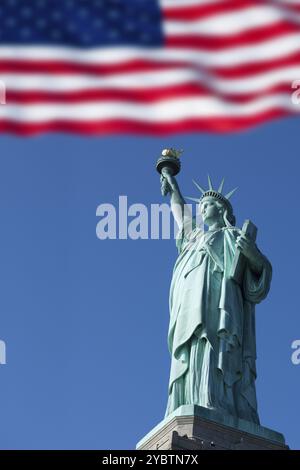 Statue of Liberty and the US Flag, New York City, New York, USA, North America Stock Photo