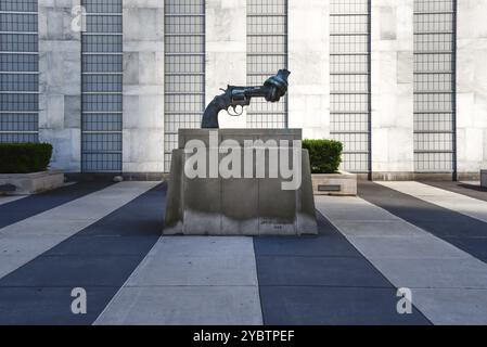 New York City, USA, June 21, 2018: Peace Sculpture in United Nations Headquarters in New York City including General Assembly. The complex has served Stock Photo