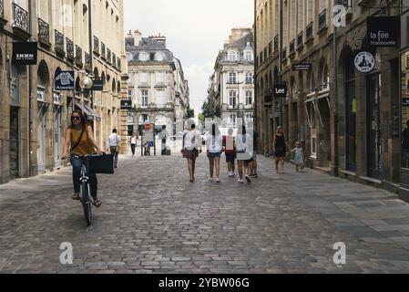 Rennes, France, July 23, 2018: People walking on commercial street in historic centre of the city, Europe Stock Photo