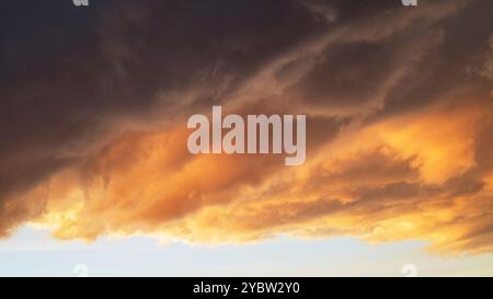 Dramatic clouds at sunset Stock Photo