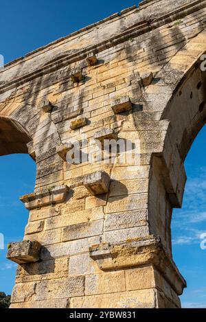 Architectural detail of the facade famous Roman aqueduct Pont du Gard, France Stock Photo