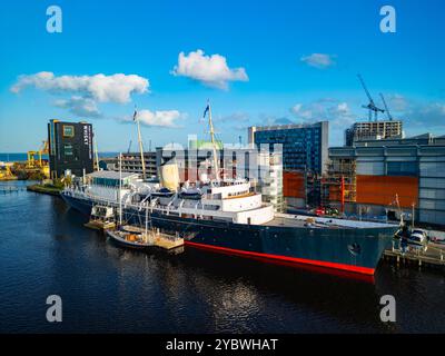 Aerial view from drone of Royal Yacht Britannia moored at Ocean Terminal , Leith, Edinburgh,  Scotland UK Stock Photo