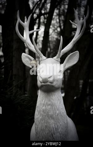 Germany. Festive Christmas. Figure of a white reindeer on a christmas market.. Outdoor decoration. December 16, 2023 Stock Photo