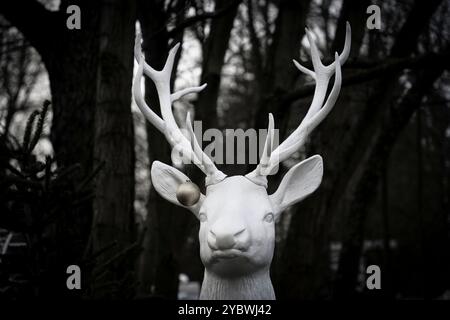 Germany. Festive Christmas. Figure of a white reindeer on a christmas market.. Outdoor decoration. December 16, 2023 Stock Photo