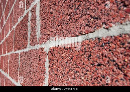 Angled view of cinder block made from crushed red brick Stock Photo