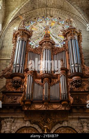 The organ in Beziers Cathedral in France is a famous pipe organ built by Theodore Puget between 1869 and 1881. Stock Photo