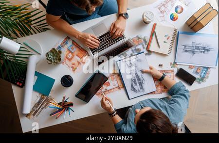 Designers working in studio and using sketches. Stock Photo