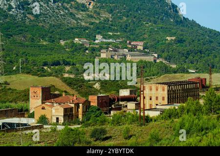 Former railway station of the Monteponi mine, abandoned mine of Monteponi, in Iglesias, Sulcis Iglesiense, province of southern Sardinia, Italy Stock Photo