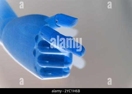 Robot hand pointing with index finger isolated on transparent background Stock Photo