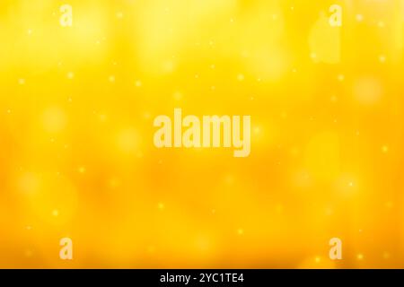 abstract photo of light gold, yellow abstract background with bokeh defocused lights. image is blurred and filtered Stock Photo