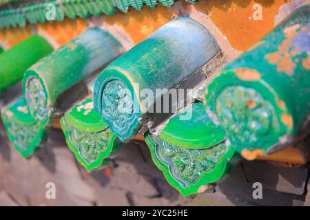 The blue glazed tiles on the wall as the background, the traditional architecture，Very elegant Stock Photo