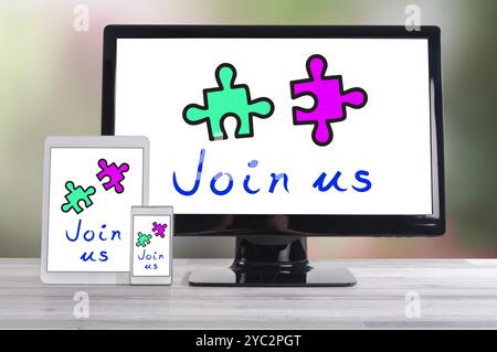 Cooperation concept shown on different information technology devices Stock Photo