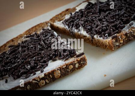 Slice of bread with hagelslaag. Typical Dutch bread topping for breakfast Stock Photo