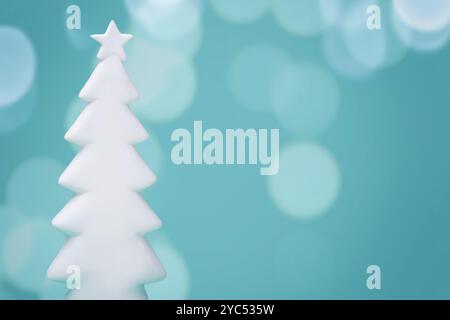 White Christmas tree on blue teal background Stock Photo