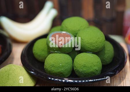 Mochi made with green tea, a Japanese dessert Stock Photo