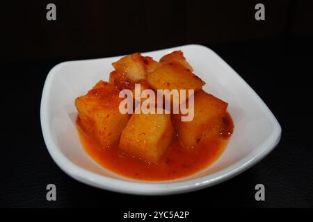 Kkakdugi(Diced Radish Kimchi) is a type of kimchi made with radish in Korean cuisine Stock Photo