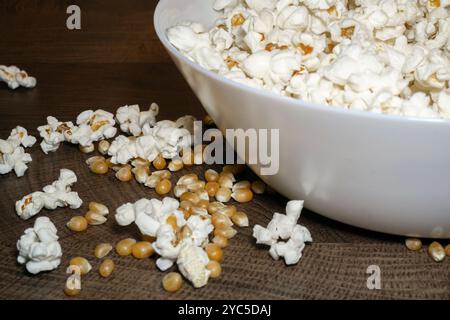 popcorn close up. popcorn with selective focus. popcorn, corn grains on a wooden table Stock Photo