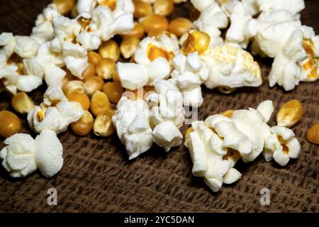 popcorn close up. popcorn with selective focus. popcorn, corn grains on a wooden table Stock Photo
