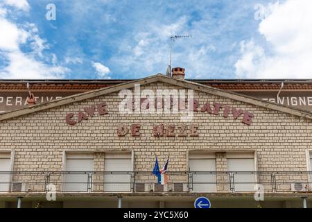 Former Cave Cooperative des Vignerons (wine making cooperative) now Annex of Town Hall (Mairie)  Meze, Herault, Occitanie, France, Europe Stock Photo