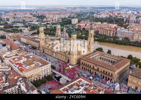 Aerial view of 'La Carrera de la Mujer' ending in Plaza del Pilar in Zaragoza, Spain.   Zaragoza turns pink this Sunday in the Women's Race, with 14,0 Stock Photo