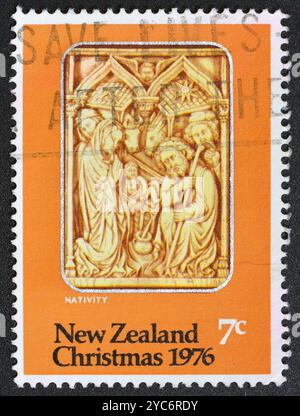 Cancelled postage stamp printed by New Zealand, that shows 'Nativity' (Spanish ivory carving), Christmas, circa 1976. Stock Photo