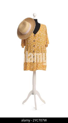 Female mannequin with stylish yellow dress and straw hat isolated on white Stock Photo