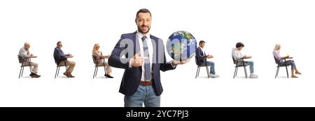 People in school chairs and man holding the planet earth on his hand and pointing isolated on white background Stock Photo