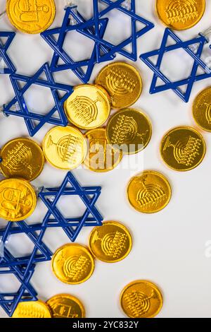 Gold Gelt and Blue Stars of David on White Background. Hanukkah ...