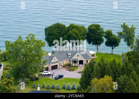 Upscale suburban home on lake Ontario waterfront area in Rochester, NY. Private residential houses in rural suburban sprawl in upstate New York. Stock Photo