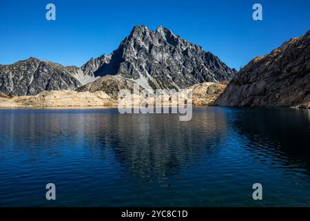 WA25835-00...WASHINGTON - Mount Stuart reflected in Ingalls Lake on a windy day in the Alpine Lakes Wilderness. Stock Photo