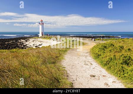 This lighthouse on Griffiths Island was built in 1859 and it is one of the main tourist attractions of the area, Port Fairy, Victoria, Australia, Ocea Stock Photo