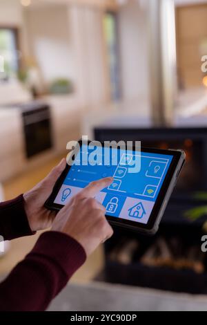 Controlling smart home devices using a digital tablet with launched ...