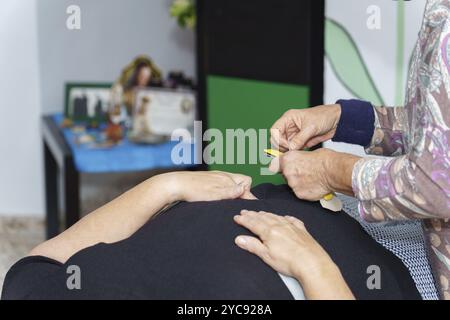 Magnet therapy system. Patient on a treatment bed with Magnetic 