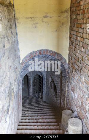 Old staircase down into a basement Stock Photo