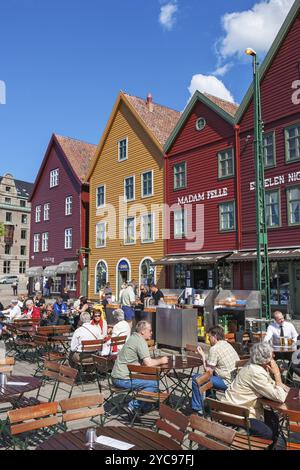 Restaurant with visitors at Bryggen in the city of Bergen, Norway, Europe Stock Photo