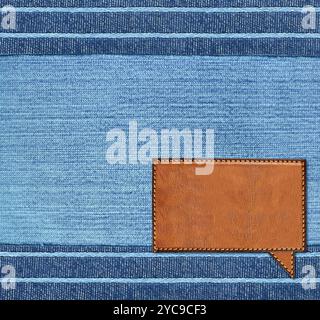 Leather comic speech bubble on denim jeans fabric texture of navy color. Sustainable development of strategy approach to zero waste, responsible consu Stock Photo