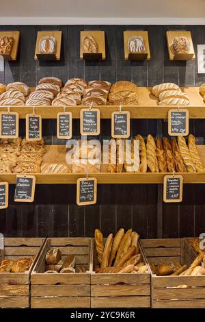Various breads in a bakery: baguettes, traditional and speciality breads *** Local Caption *** Stock Photo