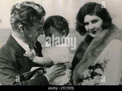 British actor Charlie Chaplin and wife Lita Grey with Charles Spencer Jr., 1925 Stock Photo