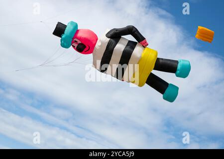 Kites being flown at the St Anne's International Kite Festival held on the beach at St Anne's, Lancashire, UK in September 2024 Stock Photo