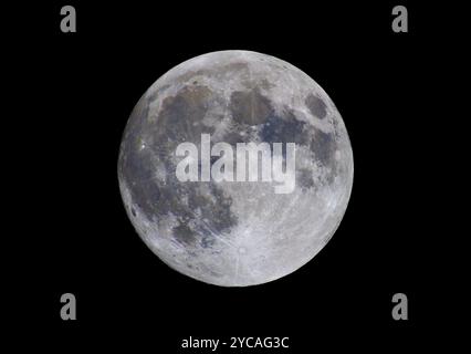 Hunter's supermoon in the October sky against a black background, taken October 16, 2024 over Ottawa, Canada Stock Photo