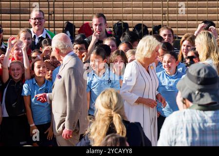 Sydney, Australia. 22nd Oct, 2024. King Charles III speaks to the school children during Queen Camilla and King Charles III visit to the Sydney Opera House on October 22, 2024 in Sydney, Australia Credit: IOIO IMAGES/Alamy Live News Stock Photo