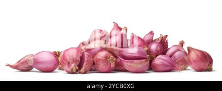 pile of shallots or small red onions isolated white background, used in cooking for mild sweet flavor and nutritional value Stock Photo