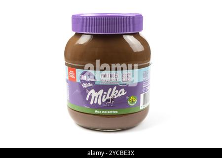 jar of Milka brand hazelnut spread, isolated on a white background Stock Photo